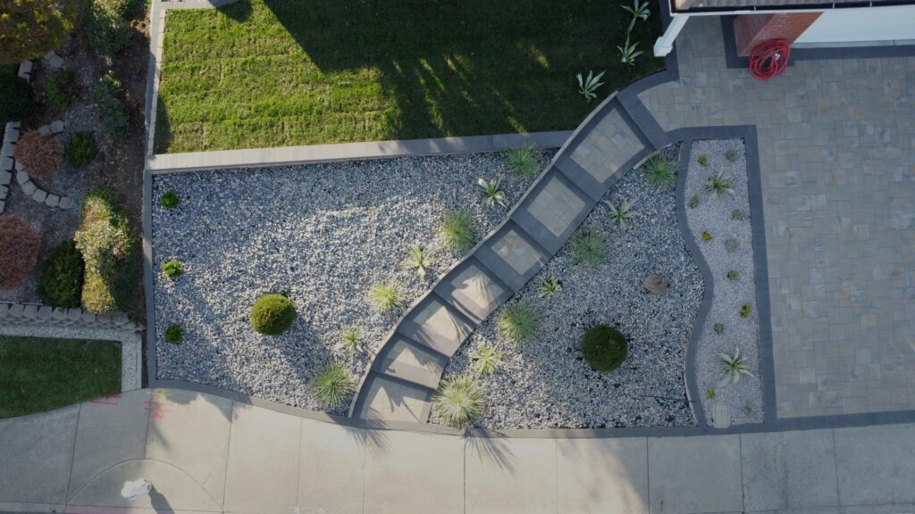 Paver Installation in Berkeley 32 Beautiful landscape design featuring a paver walkway and a stone garden with bushes