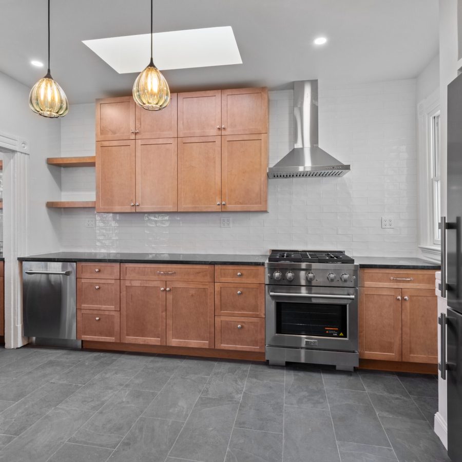 interior_remodel Geico Builders, the #1 trusted general contractor in Berkeley. Kitchen remodeling with new stainless steel appliances and brown cabinetry