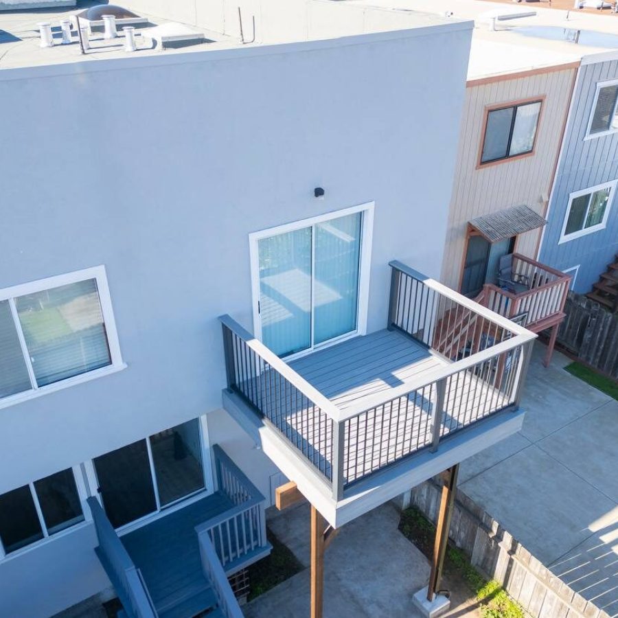 Home with a deck attached to it