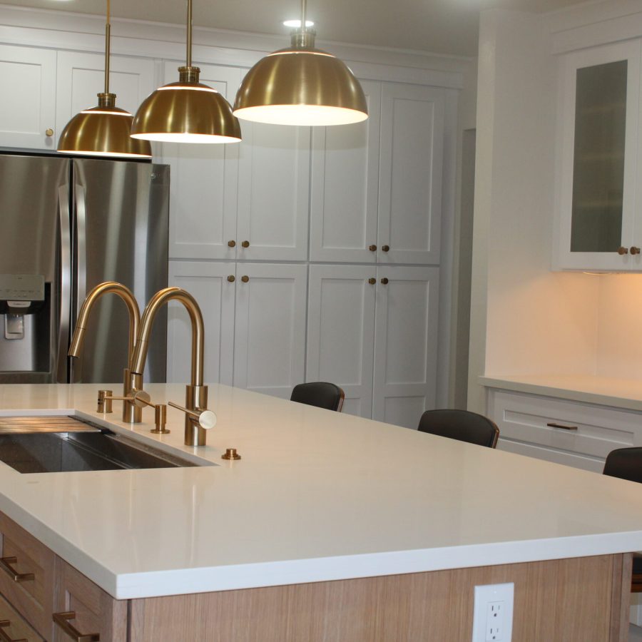 Geico builders expert kitchen remodel. Beautiful wooden island with pendant lights over it. The best general contractor in Pinole