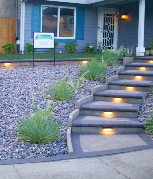 Copy of Untitled_2.12.1 Geico builders professional landscape design. Gorgeous paver walkway leading to a house surrounded by green bushes. General contractor in Orinda, California