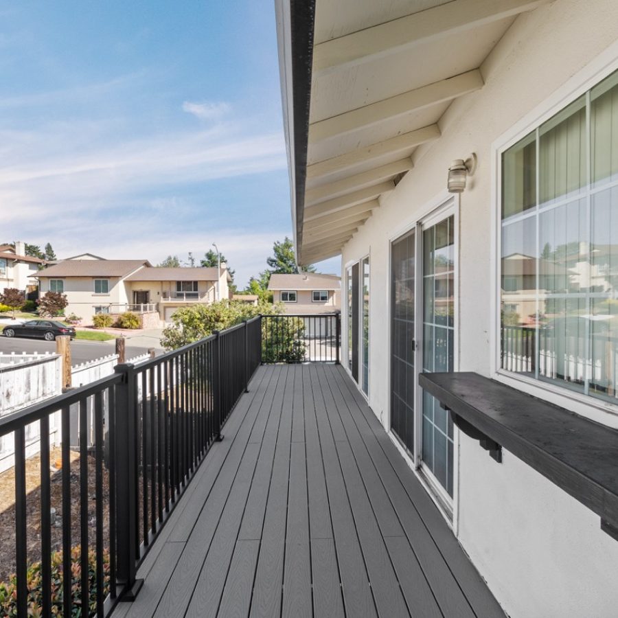 Deck Installation Services By Geico Builders4 Deck Installation. Gray custom deck with black railing