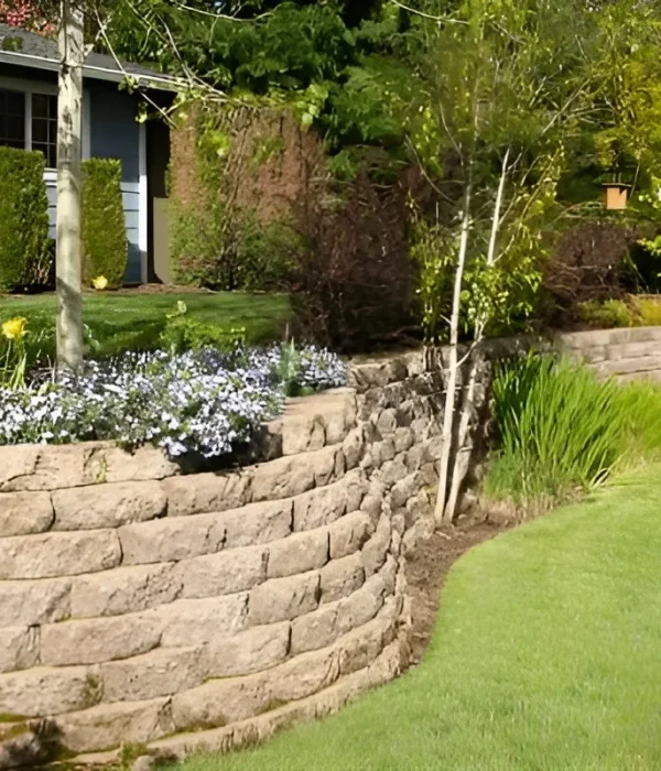 Concrete block retaining wall built by GEICO Builders