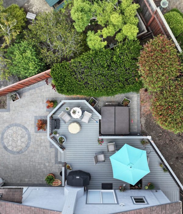 Birds eye view of outdoor remodeling services offered by Geico Builders including landscaping design, pool deck, outdoor kitchen. The #1 general contractor in San Leandro