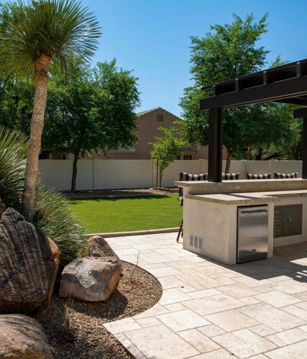 pavers Paver patio next to an outdoor kitchen