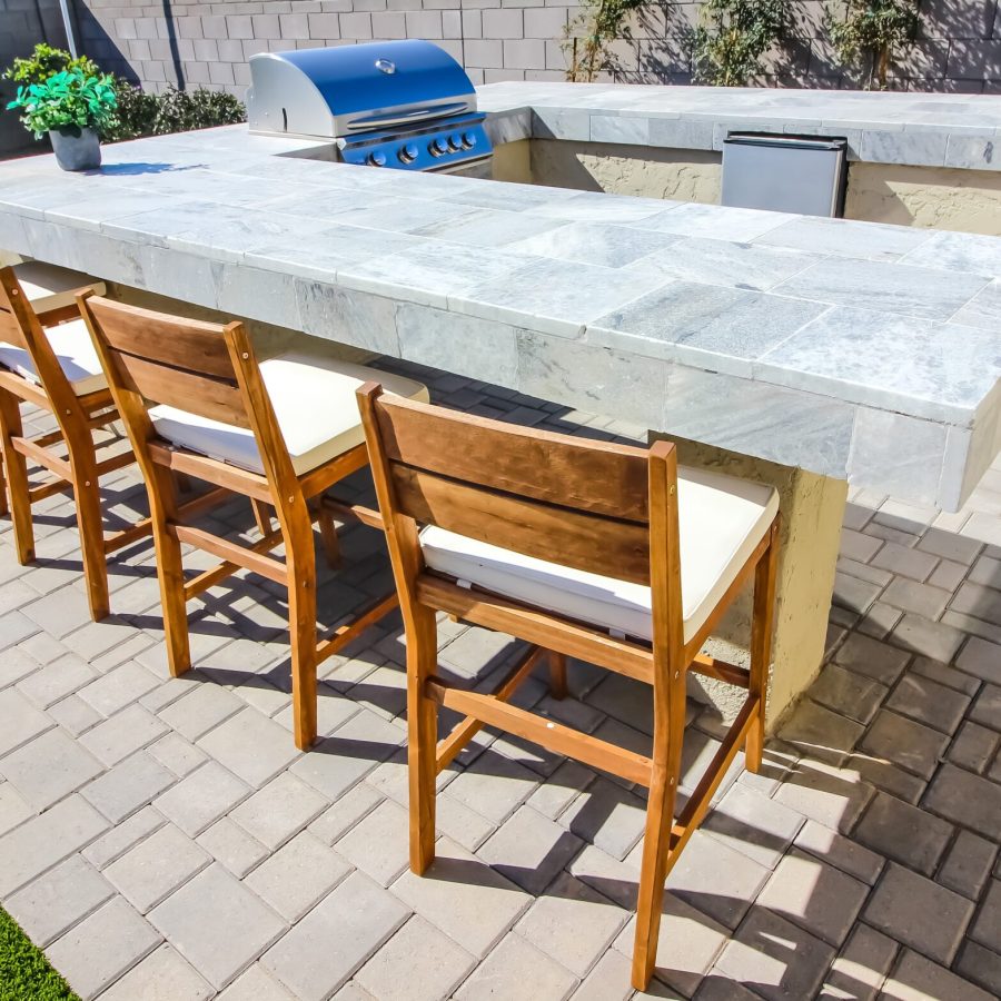 pavers Beautiful outdoor kitchen with a paver patio. Geico Builders, the best outdoor kitchen installer. Paver installation in Dublin